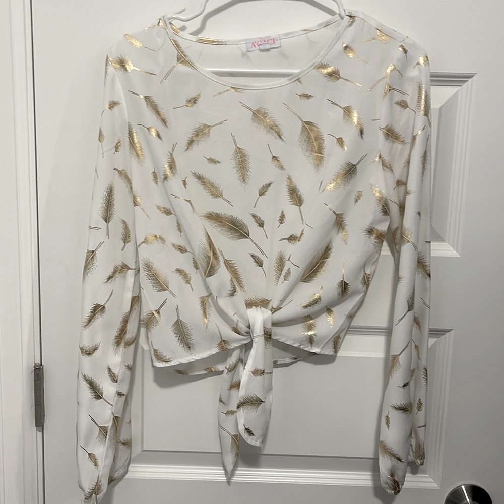 White and gold blouse , with tie detail